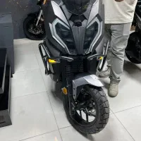 موتورسیکلت اسکوتری دیفندر کویر