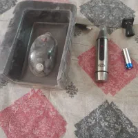 یک عدد موس کامپیوتر..یک عددماشین اصلاح بینی وخط زن