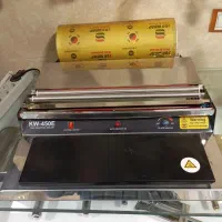 دستگاه سلفون کش به همراه یک رول سلفون