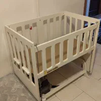 تخت کنار مادر نوزاد پیر گاردین