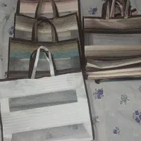 ساکهای دسته دار توری برای خریدنان میوه سبزی
