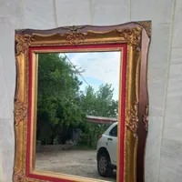 آینه همراه با قاب چوبی