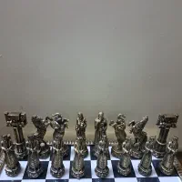مهره شطرنج فلزی هخامنشی بزرگ با صفحه شطرنج برنزی