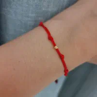 دستبند هفت گره با گوی طلا