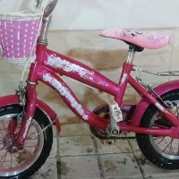 دوچرخه صورتی سایز 12