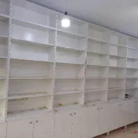 دکور داروخانه آرایشی ویترین قفسه  موبایل فروشی
