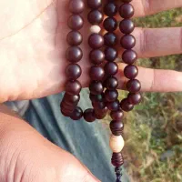 عروسک گردنبند هسته