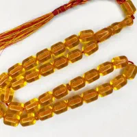 تسبیح کهربا آب حیات 33عددی رنگ نباتی شفاف