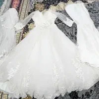 لباس عروس به همراه شنل و تور