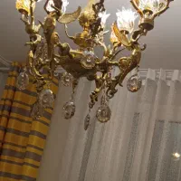 لوستر برنج فرشته ۸ شاخه هر شاخه سه شعله