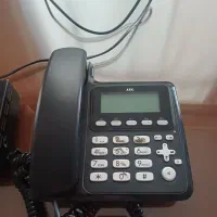 یک عدد تلفن رو میزی