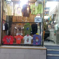 ویترین پوشاک رگال دیواری وتیله ای