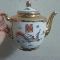 کیک خوری  و قوری