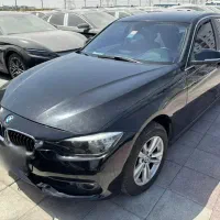 بی ام و BMW 318iپلاک موقت انزلی پشت فنس