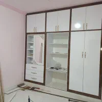 ساخت کابینت وکمددیواری در ب چوبی
