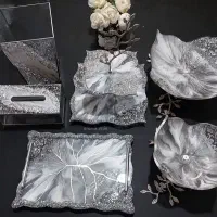 ست پذیرایی ساعت و تابلوی چهارقل و ظروف های رزینی
