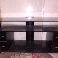 میز تلویزیون شیشه ای 4کشو