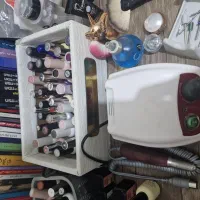 لوازم کاشت ناخن همراه با استند لاک