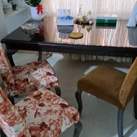 میزوصندلی نهارخوری ۶نفره روی میز شیشه‌ای