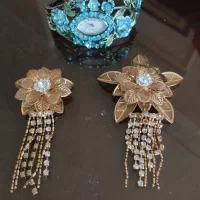ساعت مچی زنانه و آویز طلایی