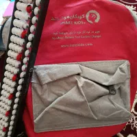 کیف به همراه چرتکه