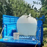 سمپاشی باغ باغچه با نیسان مخزن ۱۰۰۰ لیتر شلنک ۱۰۰