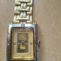 ساعت عتیقه دارای شمش طلا و جواهر
