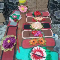 تل و گیره مو بافتنی**  کاور بطری روبان دوزی
