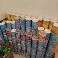 قوطی و ظرف شیر خشک سالم و درب دار