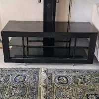 تلویزیون و میز تی وی جاکفشی