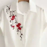 گلدوزی روی لباس با چرخ و دست