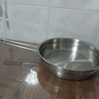 ماهیتابه کرکماز و کتری استیل