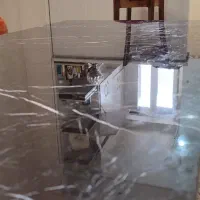 میز وسط پایه استیل رویه سنگ