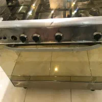 اجاق گاز فر دار ایتالیا امگا و سماور برقی 6 لیتری
