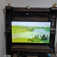 میز تلویزیون چوبی دارای چراغ