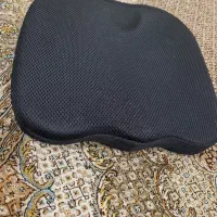 بالشت زیر نشیمنی و دنبالچه