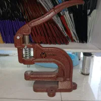 دستگاه پرس دکمه