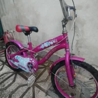 دوچرخه دخترانه پرادو سایز 16 صورتی دارای سند