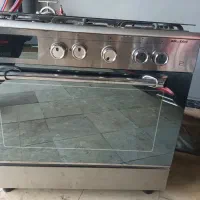 اجاق گاز ۵ شعله طرح فر استیل در حد نو میباشد