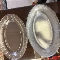 یه دستگاه پلوپز نو نو و‌تعدادی ظروف بلوری