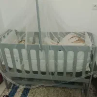 گهواره کنار تختی