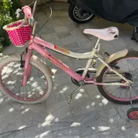 دوچرخه صورتی بچگانه