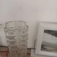 یک عدد گلدان وساعت شنی