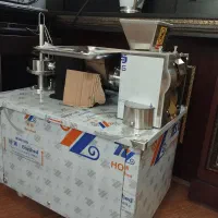 دستگاه پیراشکی زن