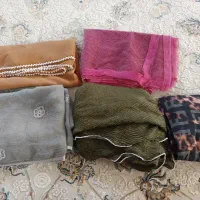 تعدادی شال نوی مجلسی و شلوار زنانه