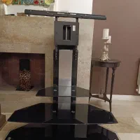 میز تلویزیون شیشه‌ای پایه دار (ایستاده)