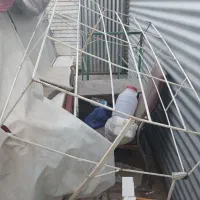 گهواره و جالباسی فلزی ایستاده