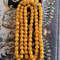 تسبیح کهربا رگه دار