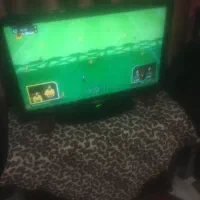 تلویزیون 32 سامسونگ با میز شیشه ای