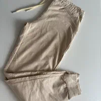 شلوار کشی کرم رنگ
